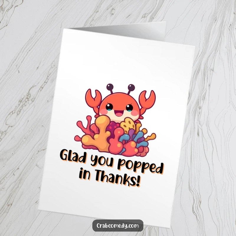 Funny Free Printable Thank You Card: A happy crab peeking from behind colorful coral, sending a thank you.