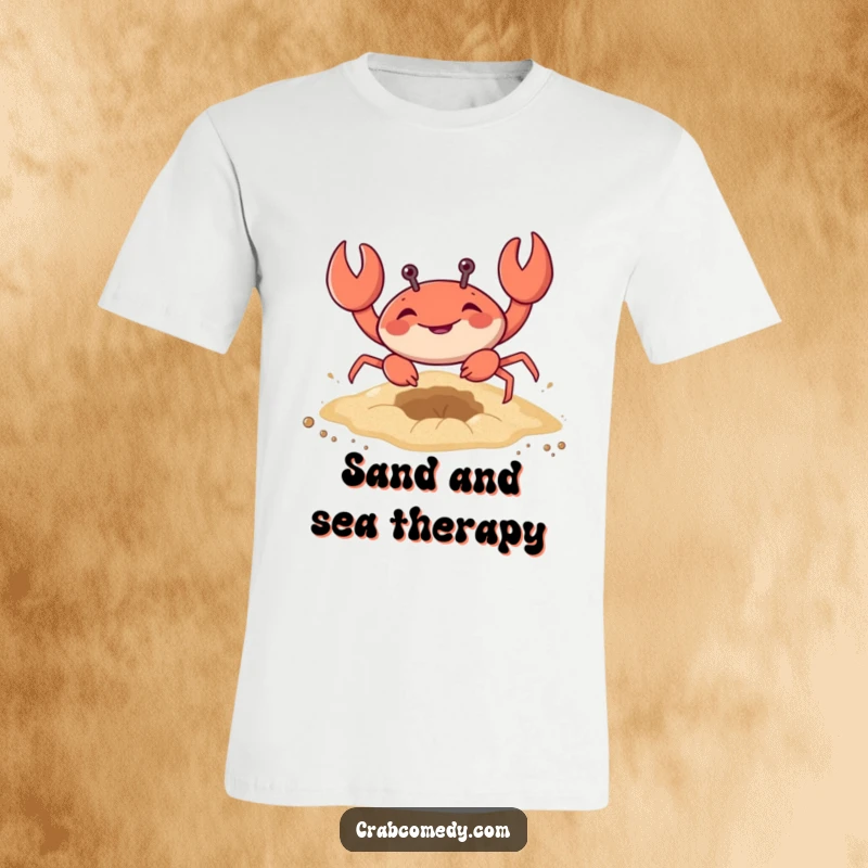 Funny t-shirt showing a smiling crab enthusiastically digging a hole in the sand, great beach gift.